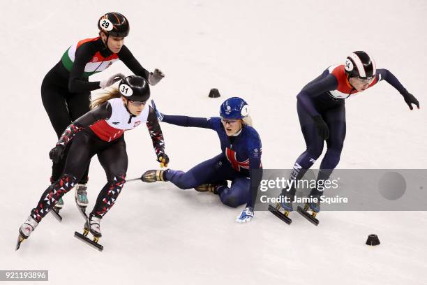 Elise Christie of Great Britain crashes out during the Ladies Short Track Speed Skating 1000m Heats on day eleven of the PyeongChang 2018 Winter...