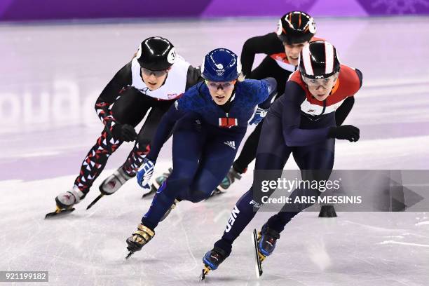 Britain's Elise Christie competes in women's 1,000m short track speed skating heat event during the Pyeongchang 2018 Winter Olympic Games, at the...