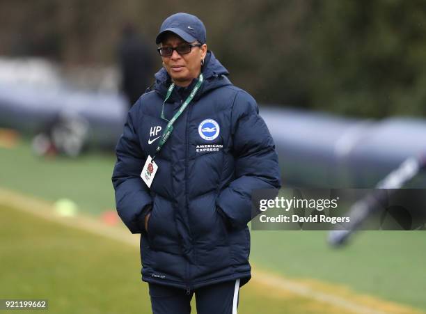 Hope Powell, the manager of Brighton and Hove Albion Women team looks on during the England training session held at Pennyhill Park on February 20,...