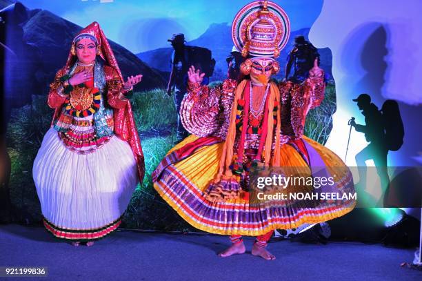 Indian artists performs the traditional dance 'Koodiyattam' during an promotional event organised by India's Kerala state tourism department in...