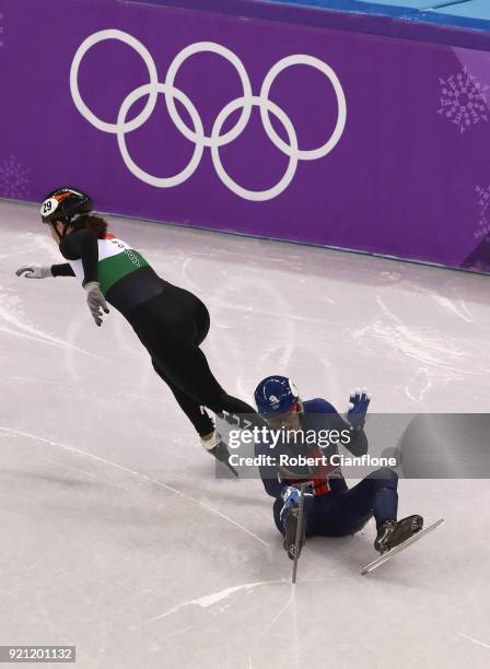 Elise Christie of Great Britain crahses at the start of heat 5 during the Ladies Short Track Speed Skating 1000m Heats on day eleven of the...