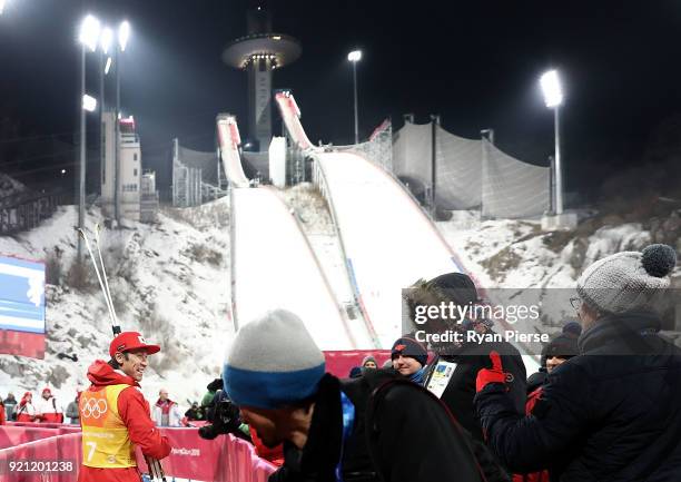 Noriaki Kasai of Japan leaves the mixed zone after the Ski Jumping - Men's Team Large Hill on day 10 of the PyeongChang 2018 Winter Olympic Games at...