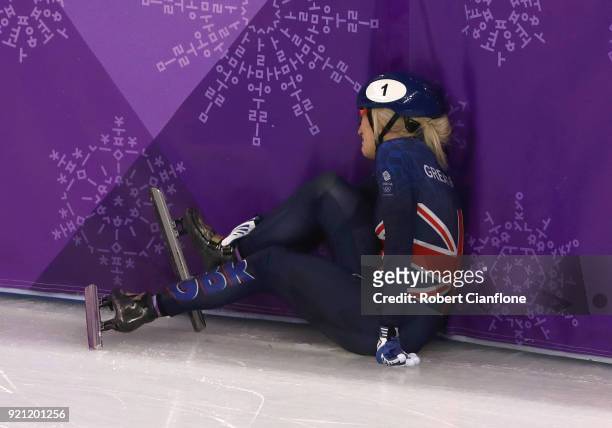 Elise Christie of Great Britain crahses at the start of heat 5 during the Ladies Short Track Speed Skating 1000m Heats on day eleven of the...