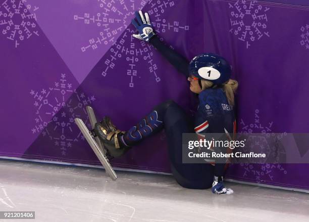 Elise Christie of Great Britain crahses at the start of heat 5 during the Ladies Short Track Speed Skating 1000m Heats on day eleven of the...