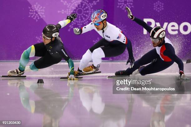 Andy Jung of Australia, Aaron Tran of the United States and Thibaut Fauconnet of France compete during the Men's Short Track Speed Skating 500m Heats...