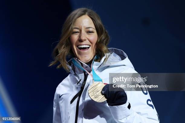 Bronze medalist Brita Sigourney of the United States celebrates during the medal ceremony for Freestyle Skiing - Ladies' Ski Halfpipe on day 11 of...