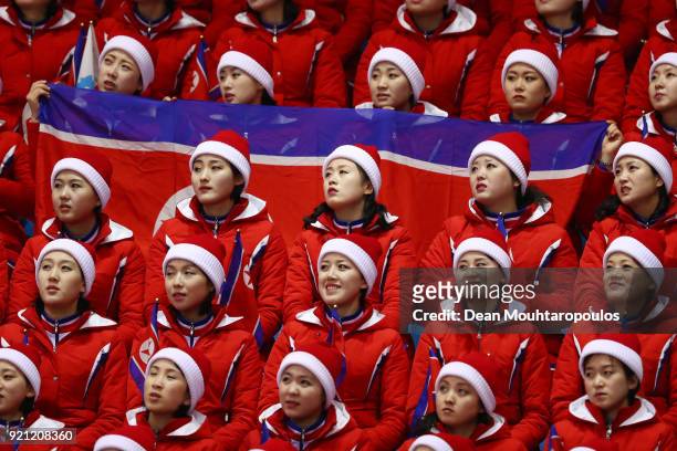 The Cheerleaders from The People's Republic of North Korea cheer on their athletes during the Men's Short Track Speed Skating 500m Heats on day...