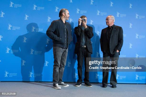 Joaquin Phoenix, Gus Van Sant and Udo Kier pose at the 'Don't Worry, He Won't Get Far on Foot' photo call during the 68th Berlinale International...