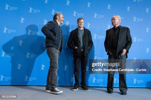 Joaquin Phoenix, Gus Van Sant and Udo Kier pose at the 'Don't Worry, He Won't Get Far on Foot' photo call during the 68th Berlinale International...