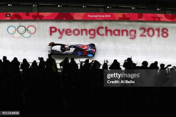 Jamie Greubel Poser and Aja Evans of the United States slide during the Women's Bobsleigh heats at the Olympic Sliding Centre on day eleven of the...