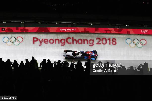 Jamie Greubel Poser and Aja Evans of the United States slide during the Women's Bobsleigh heats at the Olympic Sliding Centre on day eleven of the...