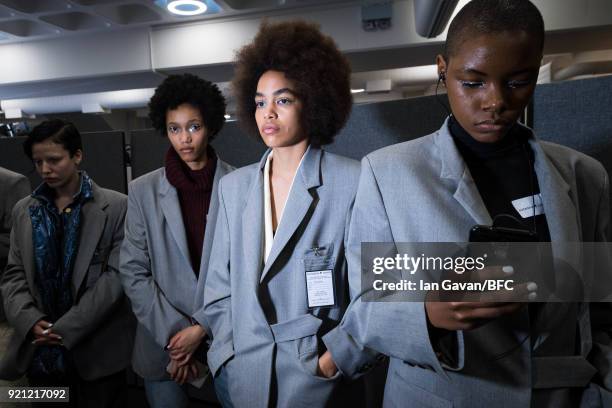 Models backstage ahead of the Natasha Zinko show during London Fashion Week February 2018 at The Queen Elizabeth II Conference Centre on February 20,...