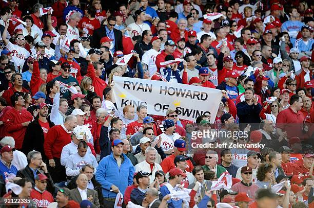 Fans of the Philadelphia Phillies hold up a sign which reads "Ryan Howard King of Swing" against the Colorado Rockies in Game Two of the NLDS during...