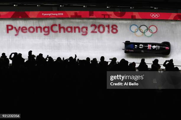 Mica McNeill and Mica Moore of Great Britain slide during the Women's Bobsleigh heats at the Olympic Sliding Centre on day eleven of the PyeongChang...