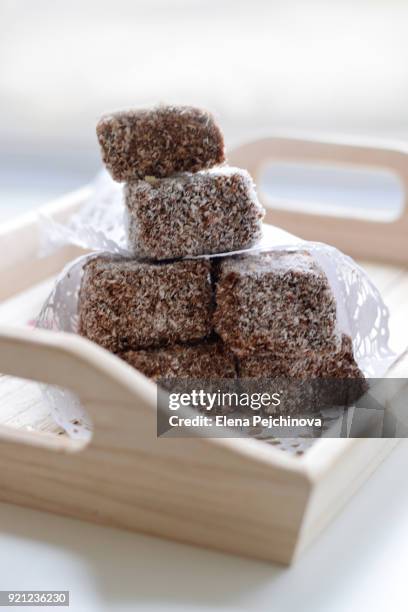 basket of coconut chocolate cake - coconut cream stock pictures, royalty-free photos & images