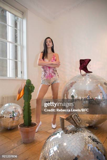 Model poses at the Alexander White Presentation during London Fashion Week February 2018 at Somerset House on February 20, 2018 in London, England.