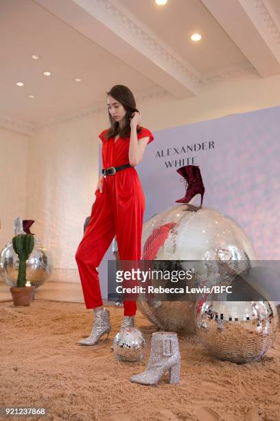 Model poses at the Alexander White Presentation during London Fashion Week February 2018 at Somerset House on February 20, 2018 in London, England.
