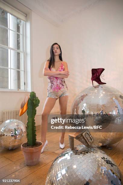 Model poses at the Alexander White Presentation during London Fashion Week February 2018 at Somerset House on February 20, 2018 in London, England.