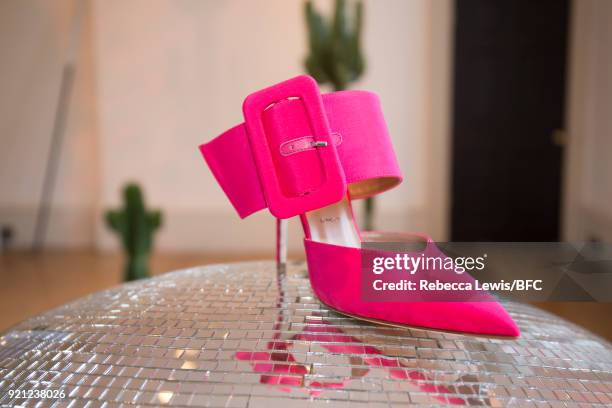 Model, shoe detail, poses at the Alexander White presentation during London Fashion Week February 2018 on February 20, 2018 in London, England.