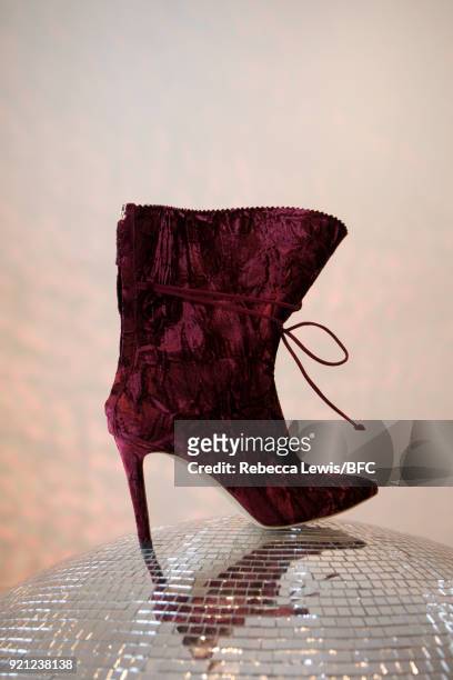 Model, shoe detail, poses at the Alexander White presentation during London Fashion Week February 2018 on February 20, 2018 in London, England.