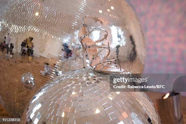 Model, shoe detail, poses at the Alexander White presentation during London Fashion Week February 2018 on February 20, 2018 in London, England.