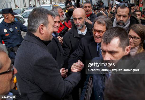 Former President of the Generalitat of Catalonia Artur Mas shake hands with supporters as he leaves the Supreme Court on February 20, 2018 in Madrid,...