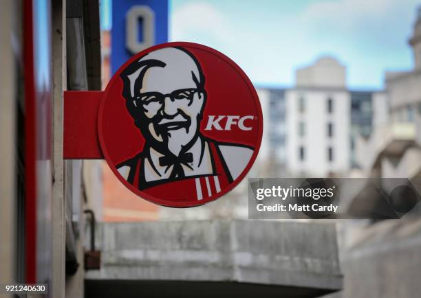 The KFC logo is pictured outside a branch of KFC that is closed due to problems with the delivery of chicken on February 20, 2018 in Bristol,...