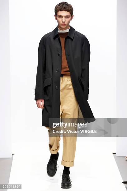 Model walks the runway at the Margaret Howell Ready to Wear Fall/Winter 2018-2019 fashion show during London Fashion Week February 2018 on February...