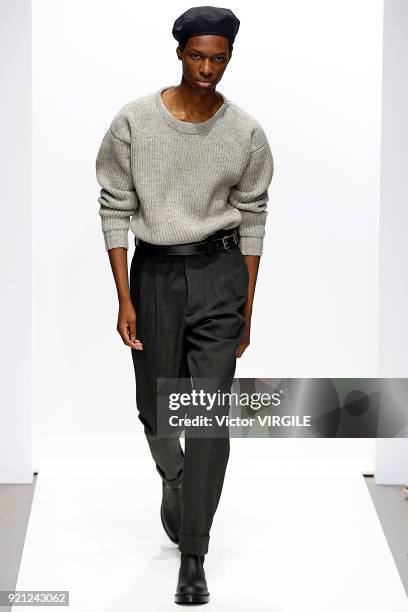 Model walks the runway at the Margaret Howell Ready to Wear Fall/Winter 2018-2019 fashion show during London Fashion Week February 2018 on February...