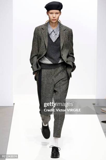 Model walks the runway at the Margaret Howell Ready to Wear Fall/Winter 2018-2019 fashion show during London Fashion Week February 2018 on February...