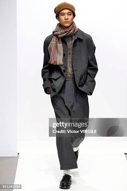 Model walks the runway at the Margaret Howell Ready to Wear Fall/Winter 2018-2019 fashion show during London Fashion Week February 2018 on February...