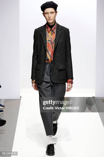 Model walks the runway at the Margaret Howell Ready to Wear Fall/Winter 2018-2019 fashion show during London Fashion Week February 2018 on February...