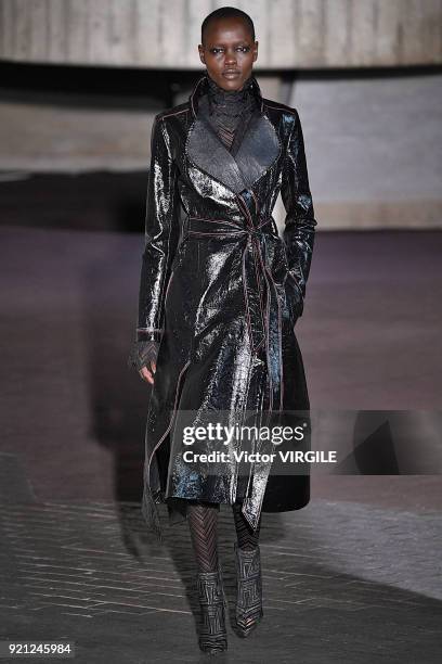 Model walks the runway at the Roland Mouret Ready to Wear Fall/Winter 2018-2019 fashion show during London Fashion Week February 2018 on February 18,...