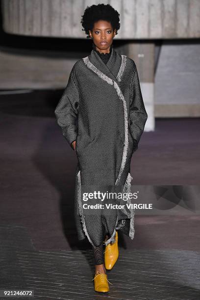 Model walks the runway at the Roland Mouret Ready to Wear Fall/Winter 2018-2019 fashion show during London Fashion Week February 2018 on February 18,...