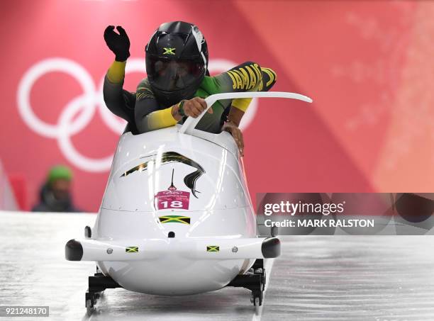 Jamaica's Jazmine Fenlator-Victorian and Jamaica's Carrie Russell compete in the women's bobsleigh heat 1 run during the Pyeongchang 2018 Winter...