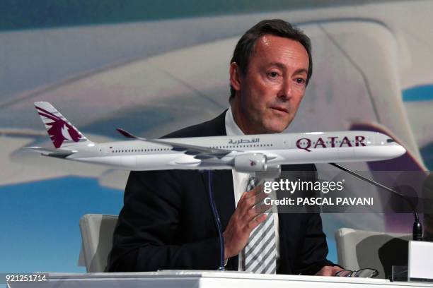 Airbus chief operating officer Fabrice Bregier speaks during a press conference announcing the delivery of the first Airbus A350-1000 bearing the...