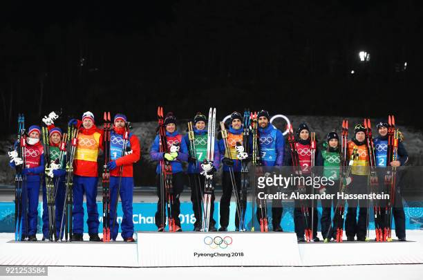 Silver medalists Marte Olsbu, Tiril Eckhoff, Johannes Thingnes Boe and Emil Hegle Svendsen of Norway, gold medalists Marie Dorin Habert, Anais...