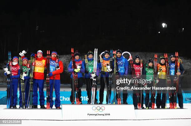 Silver medalists Marte Olsbu, Tiril Eckhoff, Johannes Thingnes Boe and Emil Hegle Svendsen of Norway, gold medalists Marie Dorin Habert, Anais...