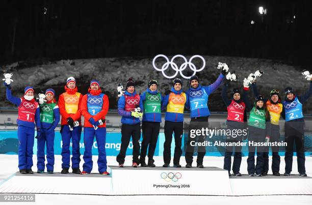 Silver medalists Marte Olsbu, Tiril Eckhoff, Johannes Thingnes Boe and Emil Hegle Svendsen of Norway, gold medalists Marie Dorin Habert, Anais...