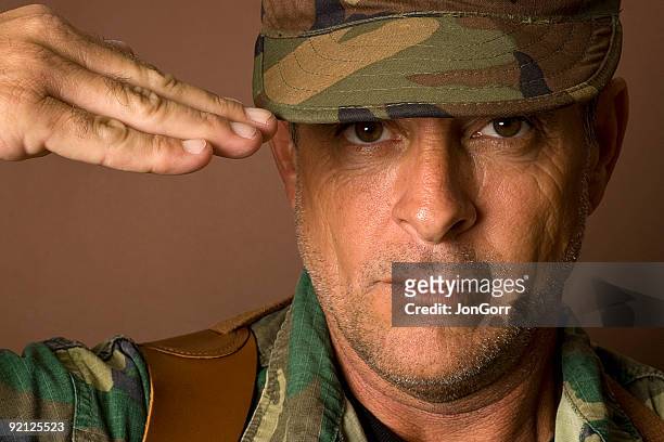 saluting soldier - thumb war stock pictures, royalty-free photos & images