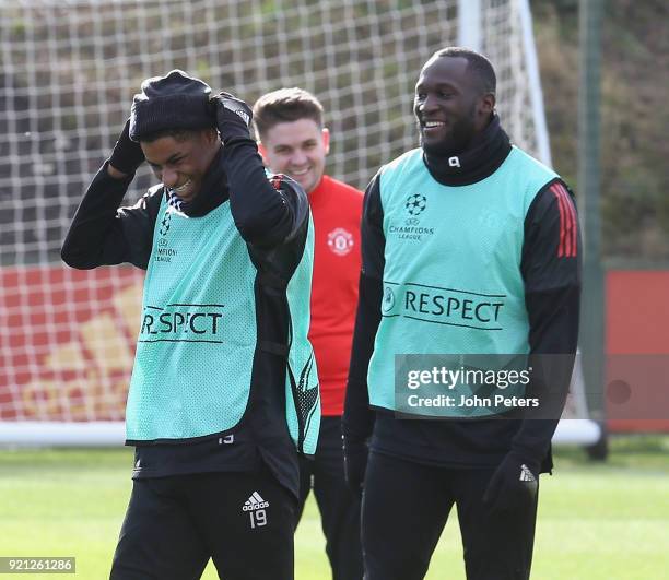 Marcus Rashford and Romelu Lukaku of Manchester United in action during a first team training session at Aon Training Complex on February 20, 2018 in...