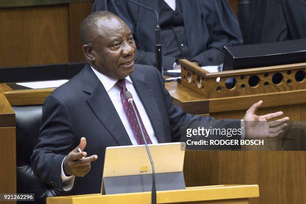 Cyril Ramaphosa, newly sworn-in South African president, addresses the South African Parliament on February 20 in Cape Town. South African President...