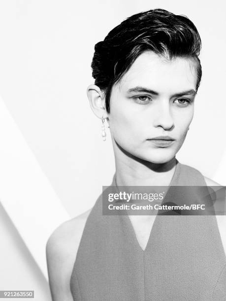 Model backstage ahead of the Emilia Wickstead show during London Fashion Week February 2018 at Great Portland Street on February 19, 2018 in London,...