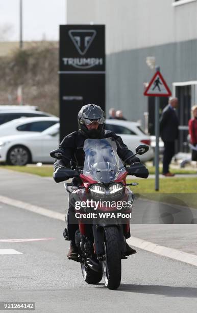 Prince William, Duke of Cambridge rides a motorbike as he visits the Triumph Motorcycles and MIRA Technology Park for a day that celebrates...