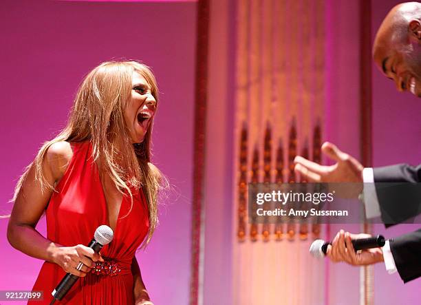 Singer Toni Braxton and sports broadcaster Tiki Barber perform at the "Breakthrough Ball" fundraising gala at The Plaza Hotel on October 20, 2009 in...