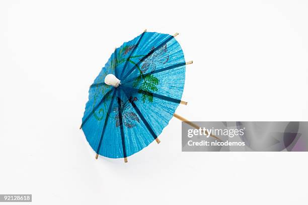 blue cocktail umbrella - paper umbrella stock pictures, royalty-free photos & images