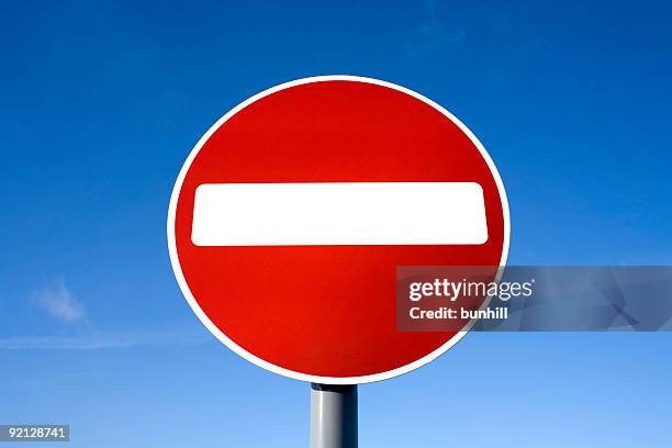 red no entry sign: do not enter against blue sky - do not enter sign stock pictures, royalty-free photos & images