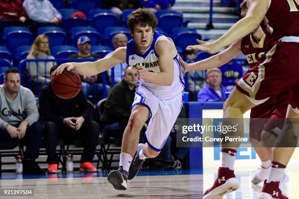 Ryan Daly of the Delaware Fightin Blue Hens dribbles against the Elon Phoenix during the first half at the Bob Carpenter Center on February 17, 2018...