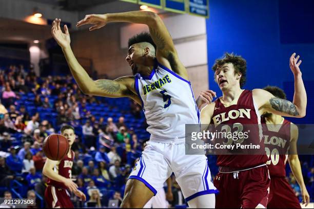 Eric Carter of the Delaware Fightin Blue Hens can't catch a high pass against Simon Wright of the Elon Phoenix during the first half at the Bob...