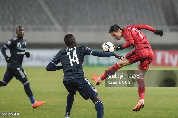 Thomas Deng of Melbourne Victory and Wu Lei of Shanghai SIPG compete for the ball during the 2018 AFC Champions League Group F match between Shanghai...